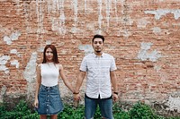 Asian couple holding hands together