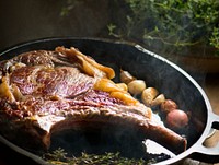 Cooking lamb steak on a pan food photography recipe idea