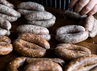 Smoked homemade sausage in a kitchen