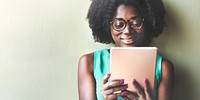 Woman wearing glasses using a tablet