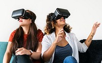 Women experiencing the virtual reality goggles
