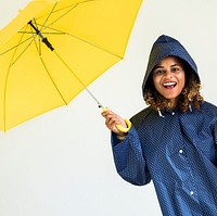 Happy girl with yellow umbrella