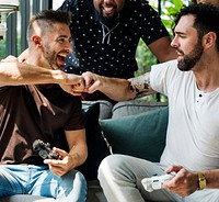 Friends enjoying video game together