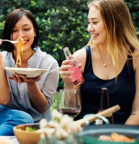 Diverse people enjoying food together