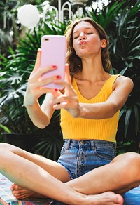 Girl taking a selfie in summertime