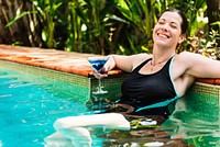Woman enjoying the water in a swimming pool