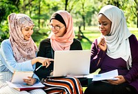 Group of islamic friends discussing and working together