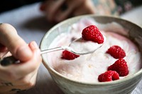 Closeup of raspberry yogurt in a bowl