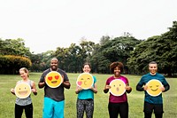 Group of diverse people with emoticon