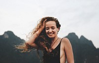 Blond woman enjoying the summer breeze