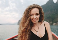 Portrait of a beautiful woman with curly hair