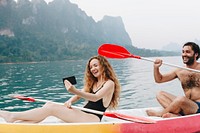 Couple paddling in a canoe