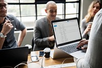 Man checking his email on a laptop