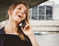 Happy woman talking on the phone