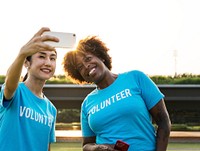 Diverse volunteers taking a selfie together