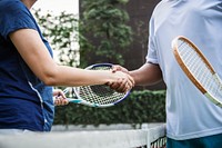 Tennis players shaking hands after a good match