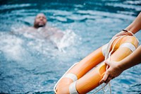 Man being rescued from the water