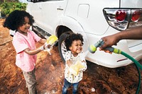 Boys washing the family car