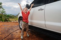 Kid helping to wash the car
