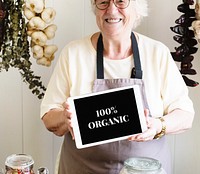 Senior woman selling 100% organic produce