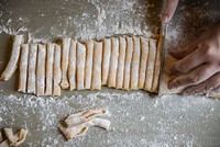 Rolled out dough cut into slices