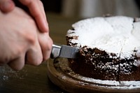 Patisserie slicing chocolate fudge cake photography recipe idea