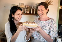 Women with homemade lemon meringue tart