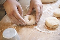 Chef preparing dough to make donuts