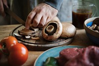 Closeup of slicing a mushroom food photography recipe idea