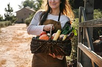Woman with fresh harvest from her garden