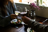 Couple at a romantic dinner with wine