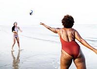 Friends playing volleyball