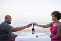 Couple having a romantic dinner at the beach