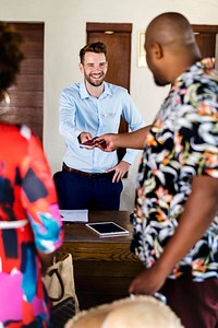 Guests checking in to a hotel