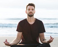 A man practicing yoga