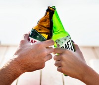 A toast with beer bottles