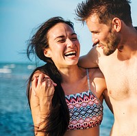 Happy couple having a romantic moment at the beach