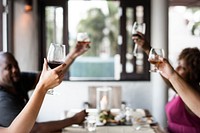 Friends drinking wine in a restaurant