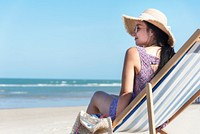 Asian woman relaxing at the beach