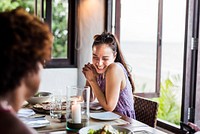 Friends having dinner at a restaurant