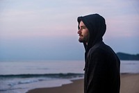 Man walking in solitude at the beach