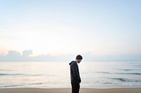 Man walking in solitude at the beach