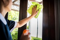 Housekeeper cleaning a hotel room