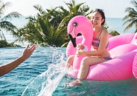 Women on a pool inflatable
