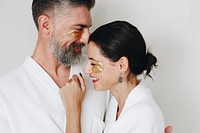 Couple relaxing with golden eye mask treatment