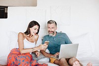 Couple using their phone while on vacation