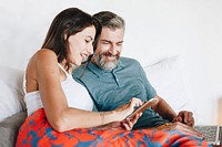 Couple using their phone while on vacation