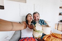 Couple relaxing on the bed