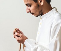 Muslim man with prayer beads