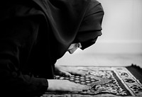 Muslim woman praying in Sujud posture